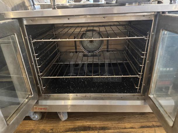 LANG Platinum gas convection oven, full size, single deck, stainless steel, interior racks, visible Lang logo, on wheels.