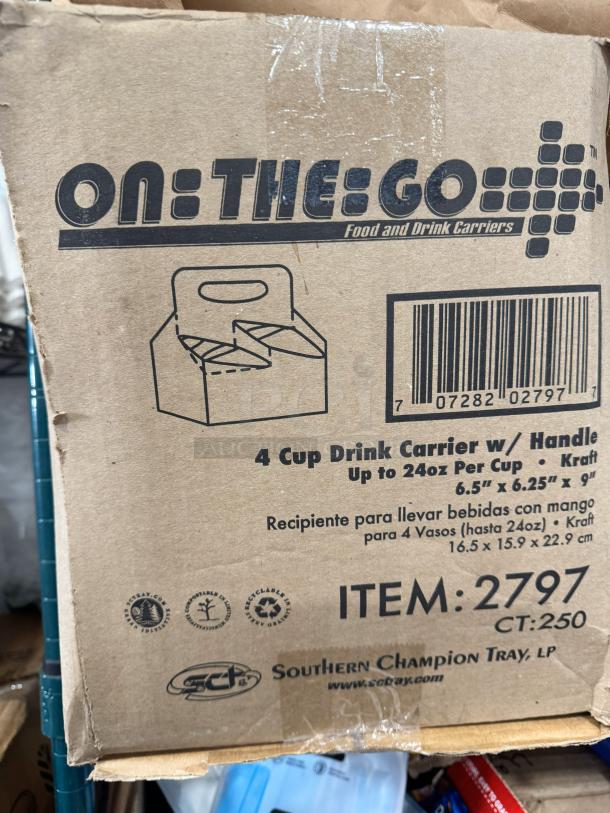 Full box of 4 cup drink carriers with handle, Kraft material, size 6.5" x 6.25" x 9". Item 2797 by Southern Champion Tray.