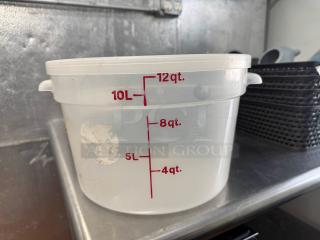 12qt round food storage container with red measurement markings for quarts and liters. Slight wear visible on surface.