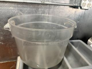 12qt round food storage container, clear plastic, with dual handles. Used condition with surface wear.