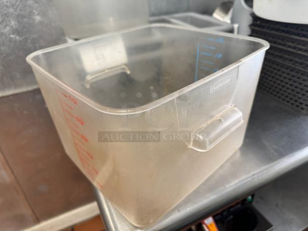 12qt transparent food storage container, marked with volume measurements, used condition, brand label visible.