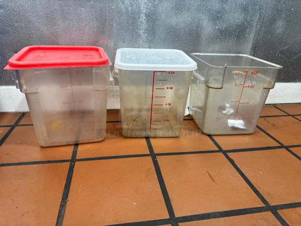 Lot of 3 food storage containers with measurement markings, red and clear lids, used condition.