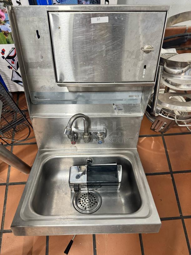 ADVANCE TABCO stainless steel wall-mounted hand sink with soap and fold paper towel dispenser, good condition.