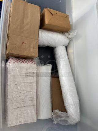 Lot of disposable food supplies including paper bags, cups, and containers in original packaging. Suitable for bulk use.