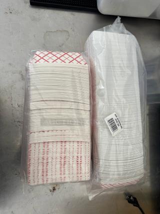 Disposable paper food trays in plastic packaging, featuring a red check pattern. Includes a barcode label.