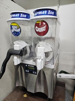 Bunn ULTRA-2 slushy machine, tested and working, stainless steel finish, missing one handle, labels for Blue Raspberry and Cherry flavors.