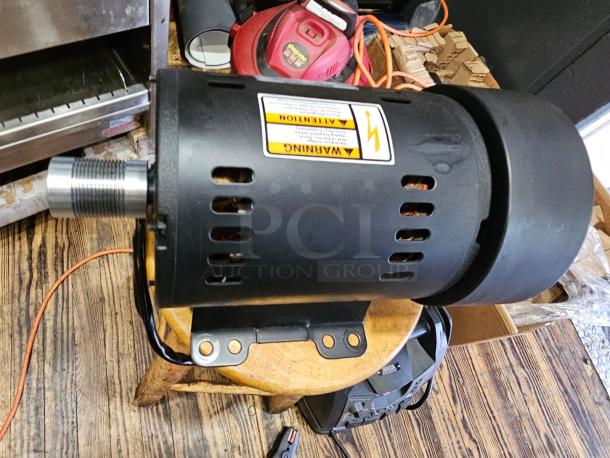 Brand new induction motor ATHH-112M1-4, 3-phase, black, warning labels visible, mounted on bracket, excellent condition.