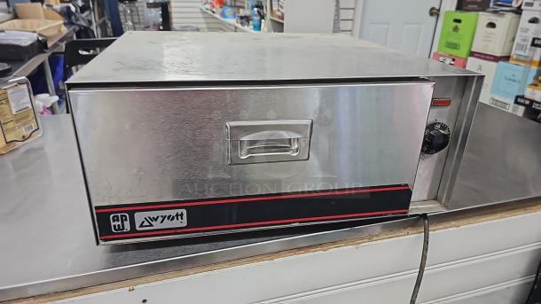 APW/WYOTT BW-30 single-drawer warmer; stainless steel; tested and working; features temperature dial and brand logo.