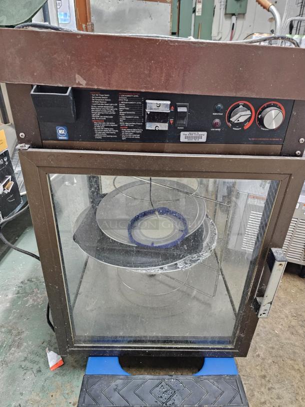 HATCO holding and display cabinet, 120V, tested and working. Features controls for heat and humidity. Used condition.