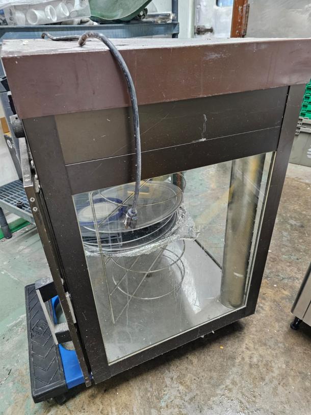 HATCO food warmer and display cabinet, 120V, tested and working, features glass panels and metal frame, used condition.