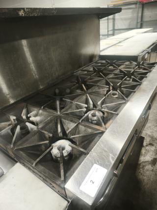 Southbend 4601DD 60" Natural Gas Range with 10 burners, 2 standard ovens, in used condition, 420,000 BTU output.