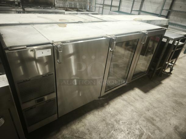Glastender BB84‑L1‑XN bar refrigerator, stainless steel, three-section, glass doors, commercial use, good condition.