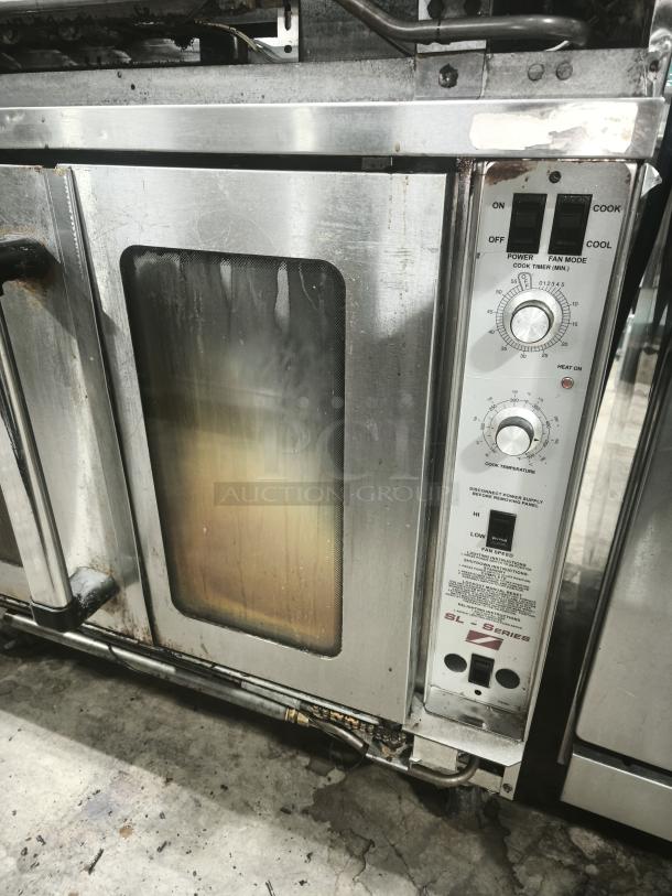 Southbend PCE15S/SI convection oven, stainless steel, visible wear, control panel with dials and switches, 240v/3ph, 7.5kW.