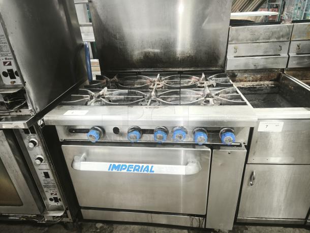 Imperial IR-6 36" 6-burner gas range with oven, natural gas, stainless steel, Imperial logo, used condition.