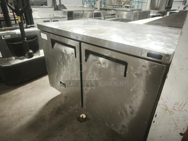 Kelvinator KCHUC48F 48" undercounter freezer with two sections and doors; stainless steel, used condition, 115v.