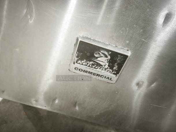 Kelvinator Commercial KCHUC48F freezer, stainless steel, visible branding. Minor surface wear.