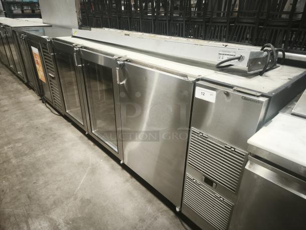 Glastender BB84-R1-SS 3-door back bar cooler, 84" stainless steel, excellent condition, visible logo and model tag.