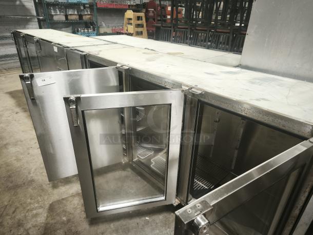 Glastender BB84-L1-XS(RRR) 84" stainless steel glass door back bar cooler; three doors open, excellent condition.