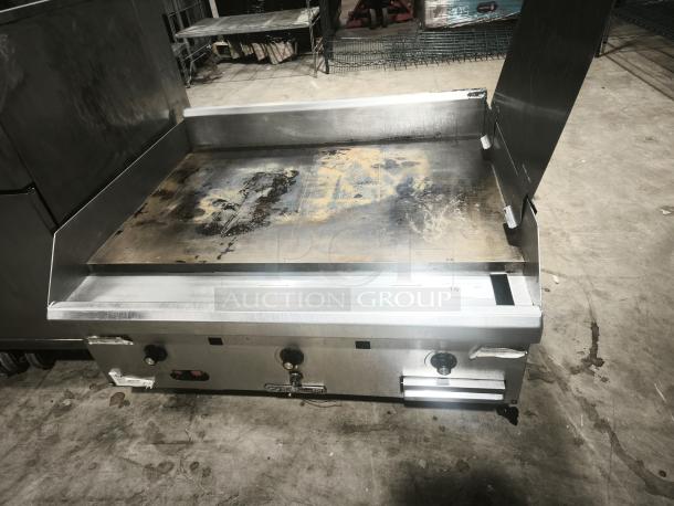Southbend HDG-36 36" gas griddle, thermostatic controls, 1" steel plate, natural gas, visible surface wear, sturdy build.