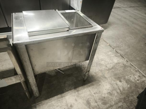 HEAVEY DUTY stainless steel under bar ice bin, 24-inch model MF48, used condition with lift-top lid and sturdy legs.
