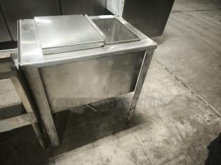 HEAVEY DUTY stainless steel under bar ice bin, 24-inch model MF48, used condition with lift-top lid and sturdy legs.