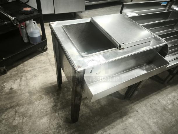 HEAVY DUTY stainless steel 24" under bar ice bin, model MF48. Features sliding cover, sturdy legs, excellent condition.