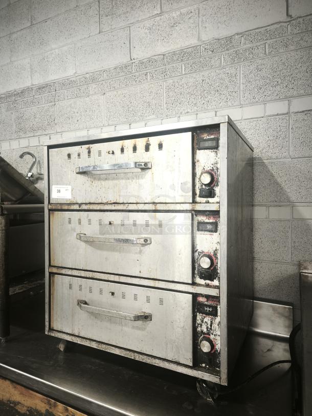 Hatco HDW-3 freestanding warming drawer with 3 compartments, model HDW-3 29, showing signs of wear, 120v.