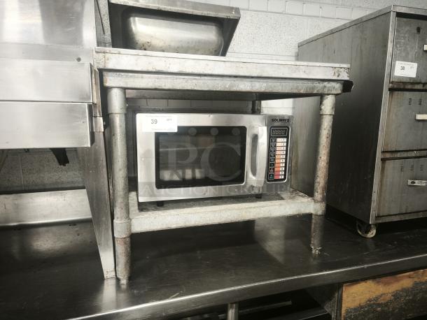 Stainless steel SOLWAVE commercial microwave, heavy-duty model with digital controls, label indicates auction item 39.