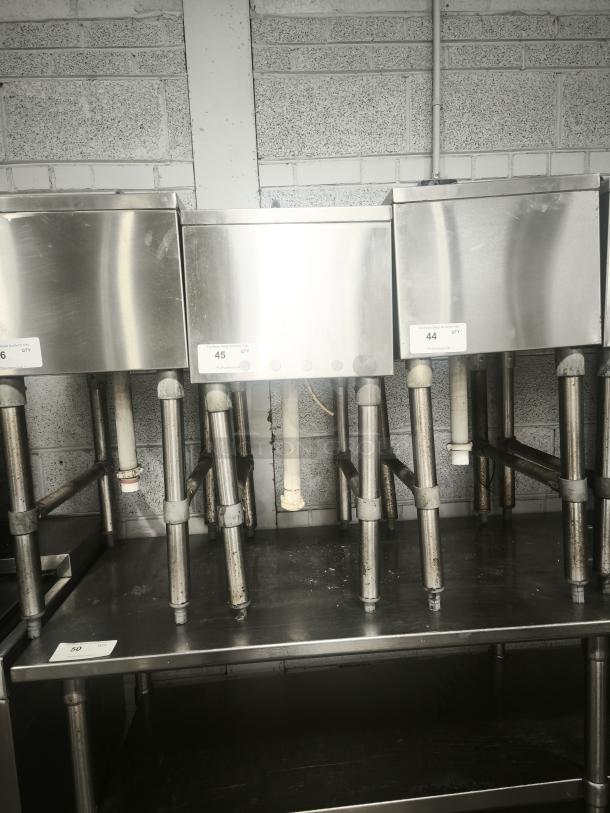 Krowne Bar Drain Board 21-GS24, stainless steel, used condition, visible support pipes, auction tags visible.