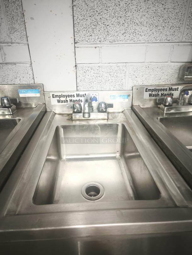 Krowne Bar Drain Board 21-GS24, stainless steel, dual faucets, signs indicate handwashing requirement, good condition.