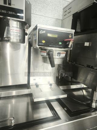 Curtis D60GT63A000 coffee maker, automatic, 9 gal/hr, stainless steel, 120/220v, clear digital display, used condition.