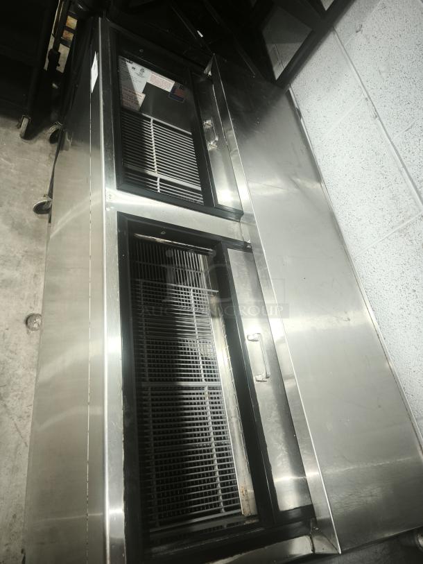 Glastender MF48-SF2 under bar glass mug froster, stainless steel, 48"W x 24"D, good condition, visible interior shelves.