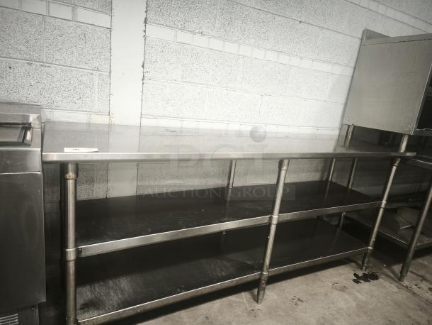 Glastender MF48-SF2 stainless steel work table with 2 shelves, excellent condition, ideal for kitchen use.