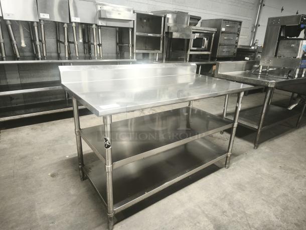 Glastender MF48-SF2 stainless steel work prep table, 24x36 inches, with double undershelf and backsplash, NSF certified.
