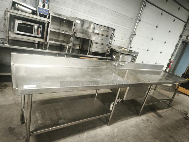 Glastender MF48-SF2 stainless steel prep table with sink, cutting board space, and undershelf. Used condition.