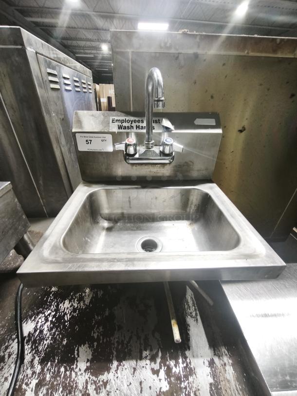 Stainless steel single basin bar sink with mounted faucet; used condition, labeled "Employees Must Wash Hands."
