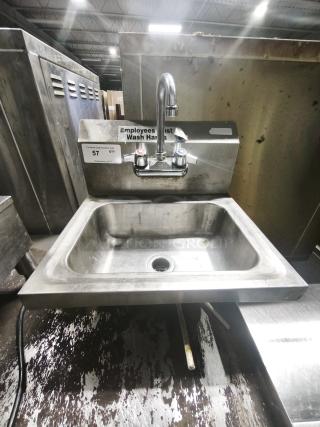 Stainless steel single basin bar sink with mounted faucet; used condition, labeled "Employees Must Wash Hands."