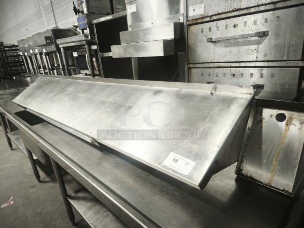 Stainless steel kitchen shelf, industrial-grade, slightly worn. Auction tag indicates item 58, quantity 1.