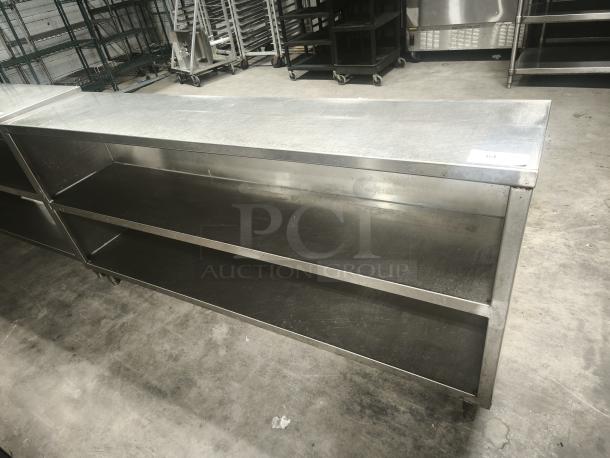 Dish storage cabinet, 60"Wx15"D, with 18-gauge stainless steel top. Features two shelves, in good condition.