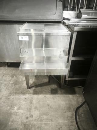 Underbar ice bin/cocktail unit with built-in 7-circuit cold plate, stainless steel, two shelving levels, auction tag visible.