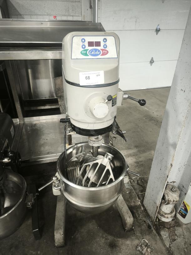 Globe SP30 30 qt planetary mixer, floor model in good condition. Features 1 hp motor, 115v, with control panel and attachments.