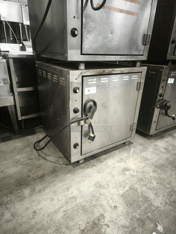 ROK RCI-P650E high-temperature lab stone oven, durable steel, used condition, visible power cord, ideal for up to 450°F use.