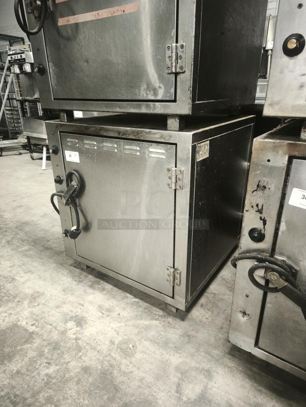 ROK RCI-P650E high-temp lab stone oven, stainless steel, 450-degree capacity, heavy-duty, visible wear, industrial setting.