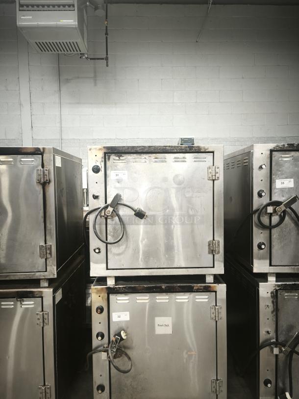 HEAVY DUTY 450°F lab stone oven, ROK, model RCI-P650E, stainless steel, used condition, visible power cords, numbered labels.