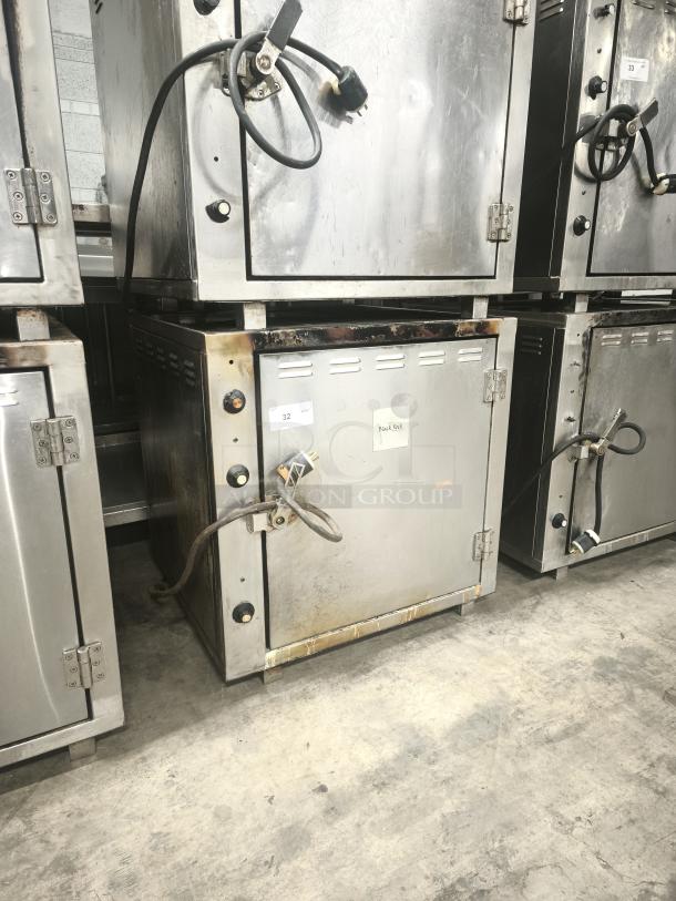 ROK RCI-P650E high temp lab stone oven, stainless steel, visible wear, tagged "32", heavy-duty model, reaches 450°F.