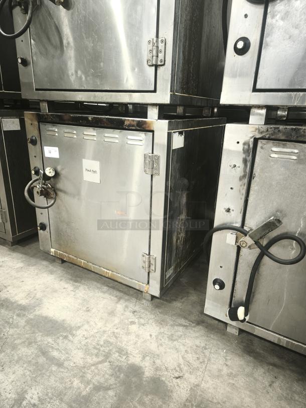 ROK RCI-P650E high-temperature lab stone oven, stainless steel, used condition, visible scuffs, tags on door indicate model.