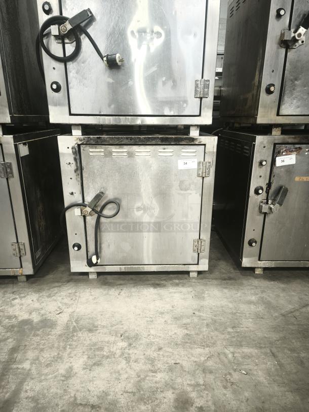ROK RCI-P650E high-temperature lab stone oven, stainless steel, holds up to 450 degrees, heavy-duty, used condition, labeled "34".