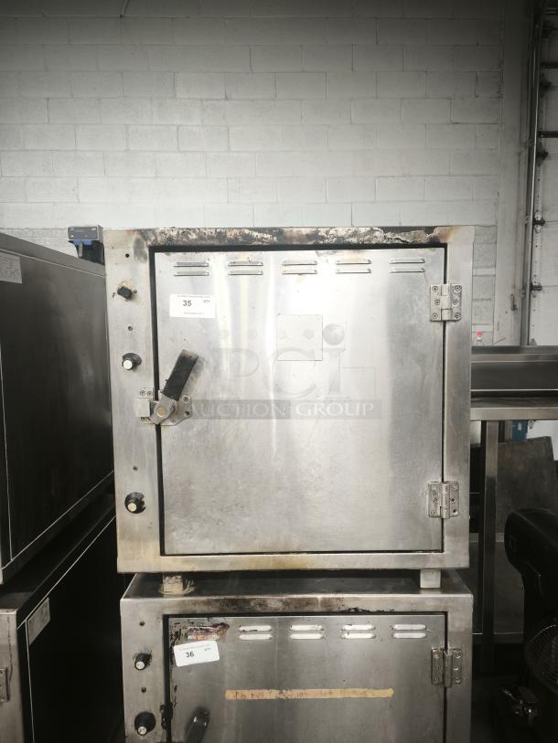 ROK RCI-P650E high-temperature lab stone oven, stainless steel, used condition with signs of wear, heats to 450 degrees.