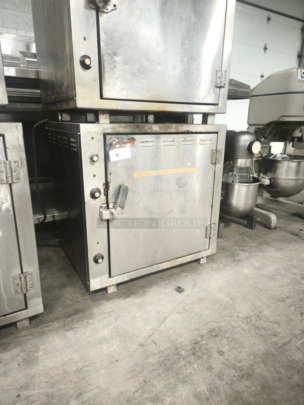 ROK RCI-P650E High Temperature Lab Stone Oven, used; heavy-duty, 450-degree capacity, sturdy metal, visible wear.
