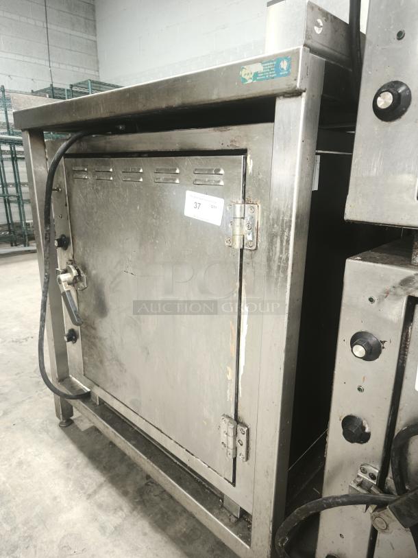 ROK RCI-P650E heavy duty lab stone oven, stainless steel, high temperature 450°F, used condition, visible wiring and dials.